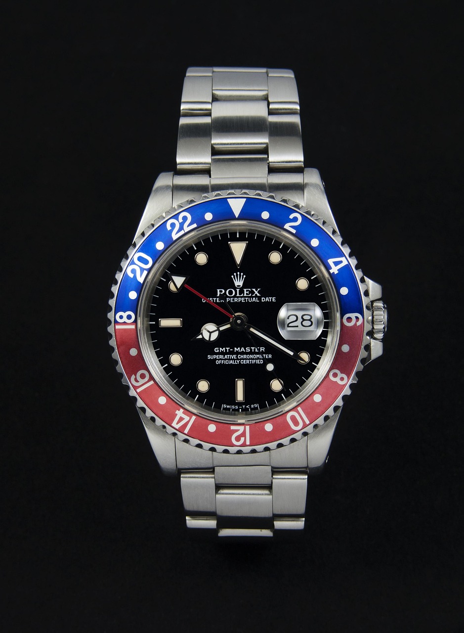 Rolex GMT-Master Pepsi horloge met rood-blauwe bezel en stalen band