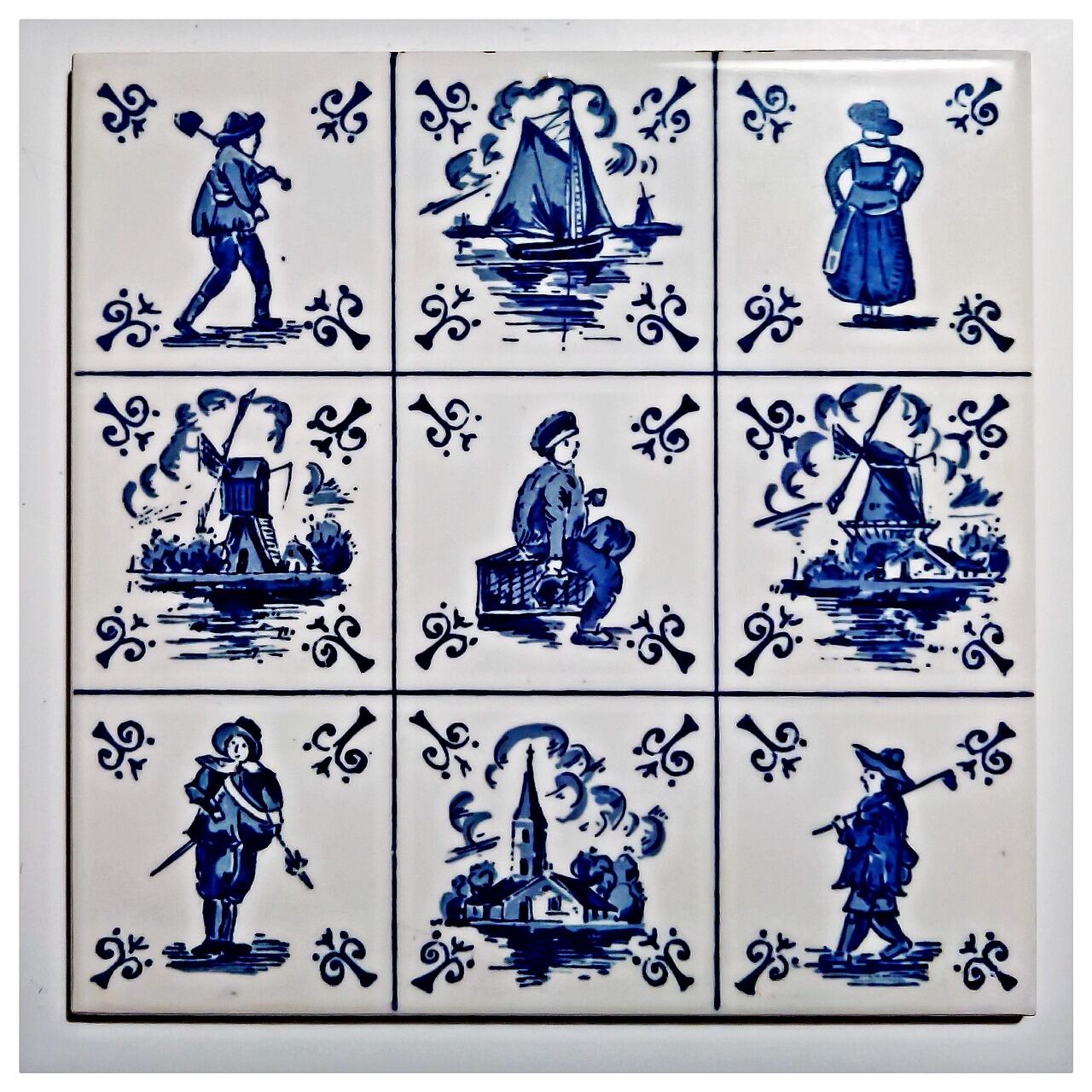 Delfts blauwe tegeltableau met Hollandse taferelen, voorbeeld van Delfts blauw taxatie